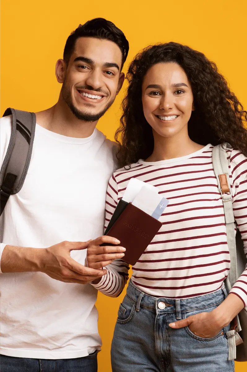 A happy couple with their flight reservations